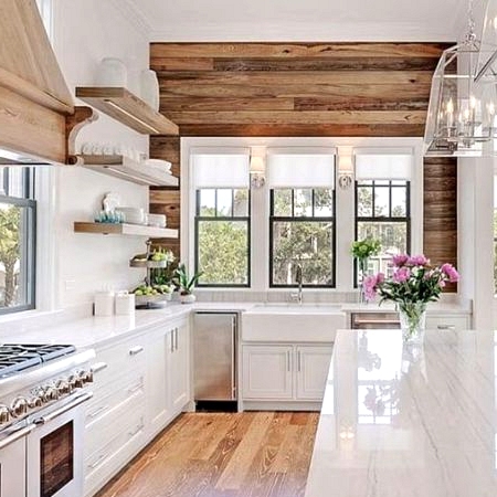 Glamorous modern farmhouse kitchen with a reclaimed wood accent wall 