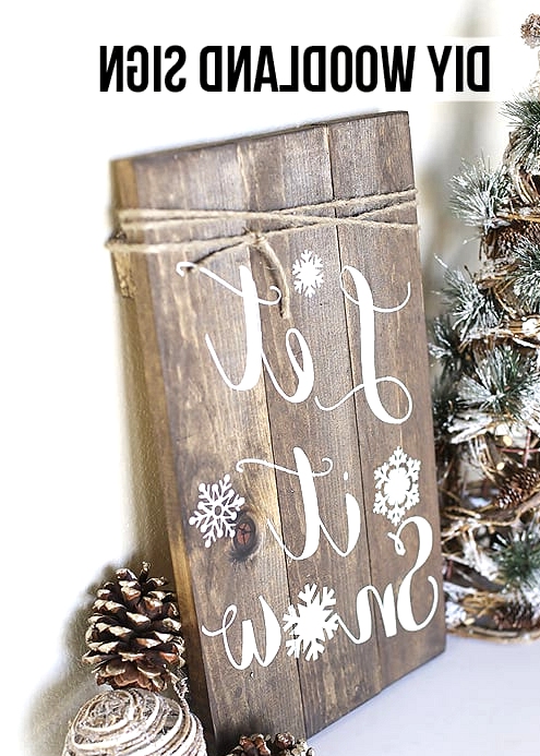 #12. DIY WOODLAND SIGN PERFECT FOR THE HOLIDAY SEASON