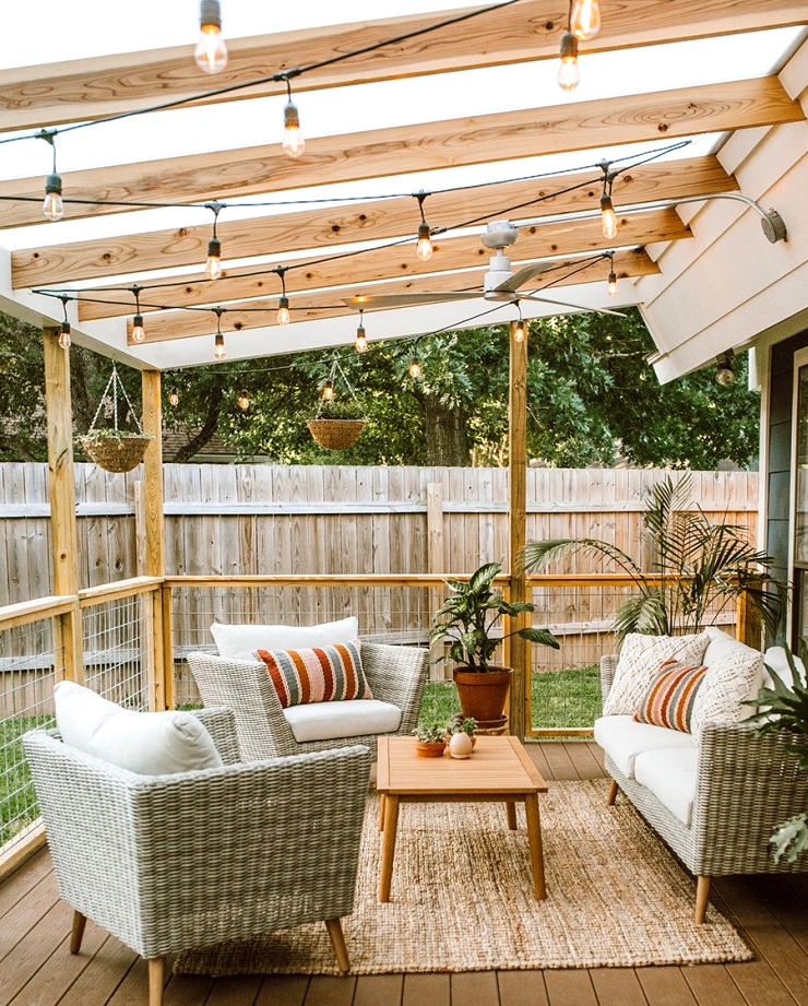 Outdoor design idea with a covered patio and string lights. 