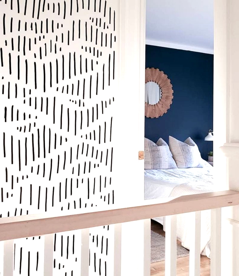 Abstract geometric sharpie wall for an inexpensive home decor project.