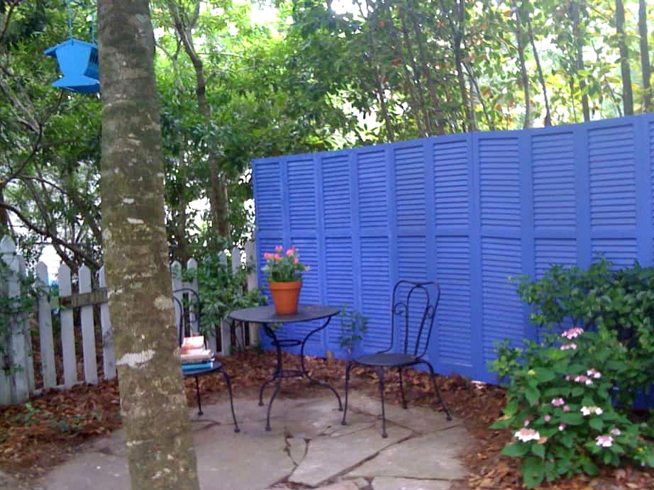 Use Old Shutters to Create a Statement Fence