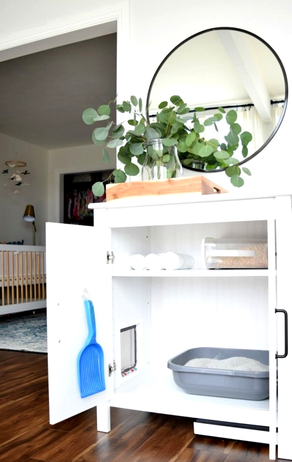 One of the best IKEA hacks for pets had to be this IKEA Storage cabinet turned Cat litter box! 