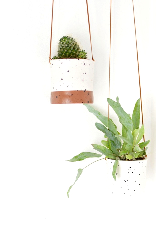 Air dry clay with a fux ceramic glaze makes the cutest DIY hanging planters