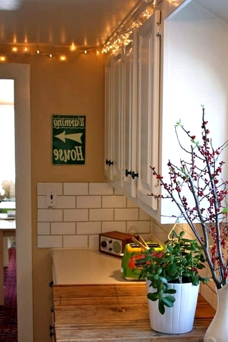 Hang Fairy Lights Above the Cabinets