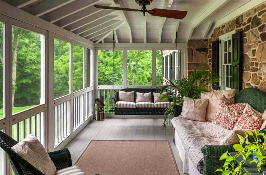 Create a Cozy Cottage Feel with Stone Wall and White Porch