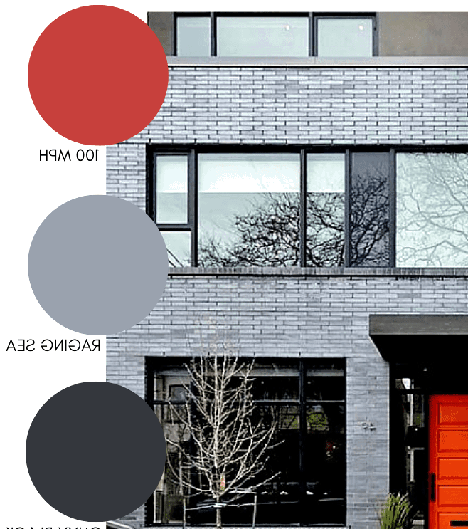 Grey brick with a painted red door. Modern exterior design. 