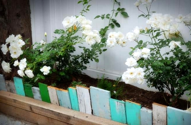 Build a Wall with Painted Wood Pallets