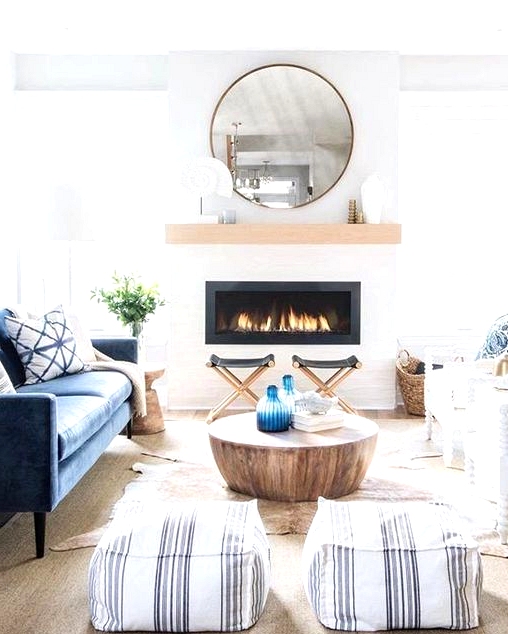Where coastal meets farmhouse. This coastal modern farmhouse living room is gorgeous. Proof you don't need to follow any rules when it comes to interior design. Check out this post for more modern living room inspirations with a farmhouse twist. 