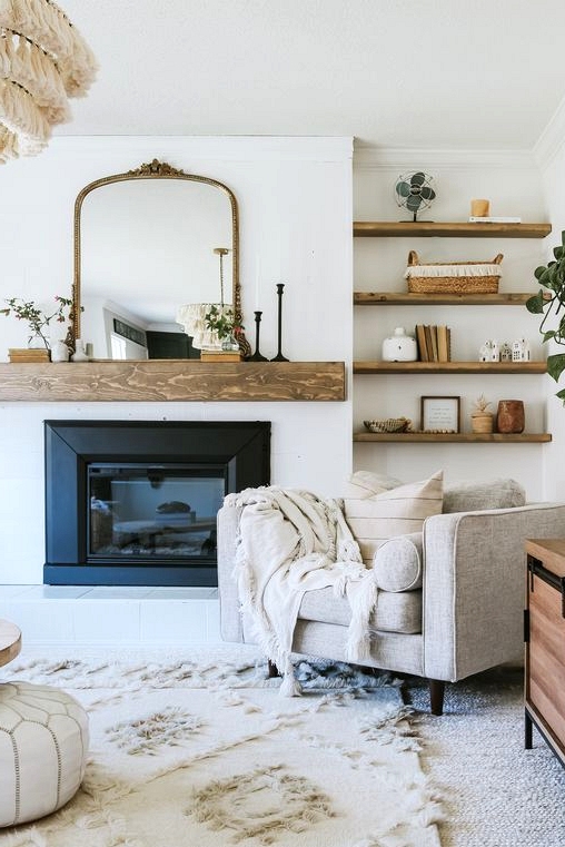 A DIY farmhouse lovers dream. Check out this DIY mantle and more modern farmhouse living room inspirations. 