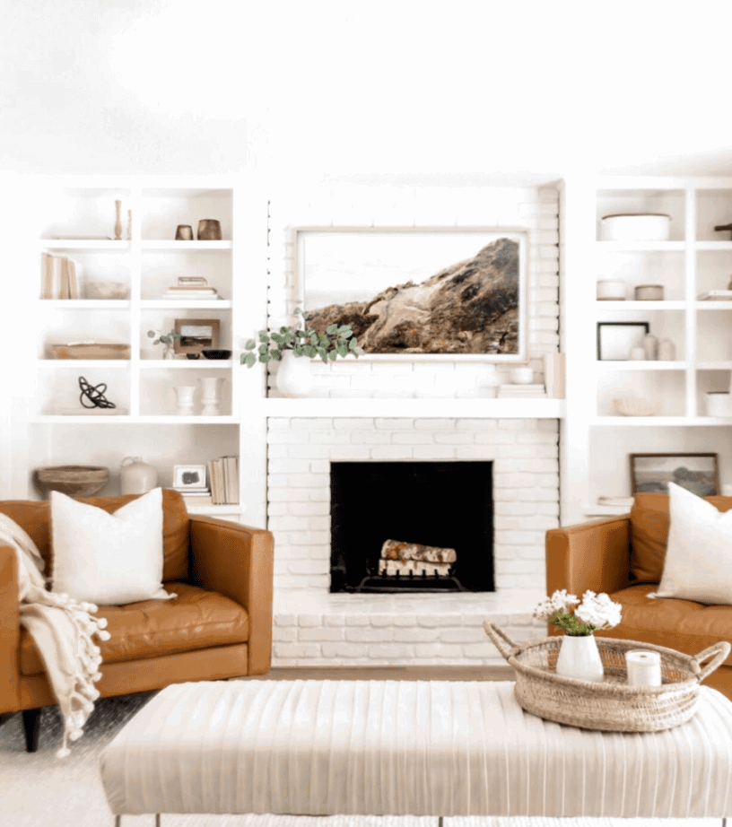 A soft and serene living room with modern farmhouse elements. Check out this post for more farmhouse living room inspirations with a modern twist. 