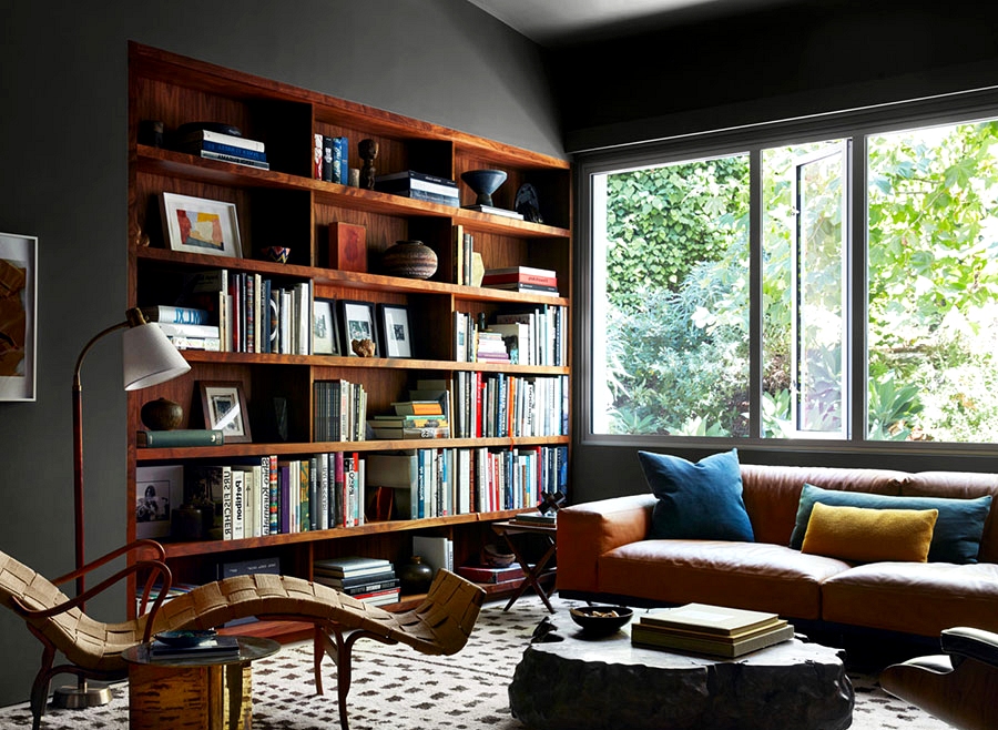 Wood furnishings and decor within the inside of a contemporary dwelling in Los Angeles