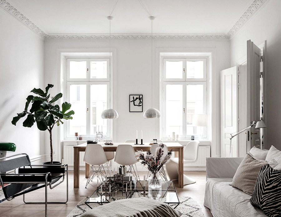 White interiors with light black accents in Stockholm apartment (82 sqm)