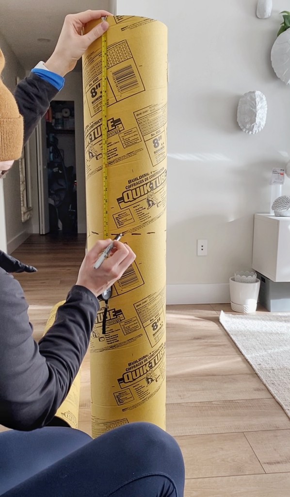 IKEA Hack - sculptural side table. Mark the leg height of the cardboard tube. 