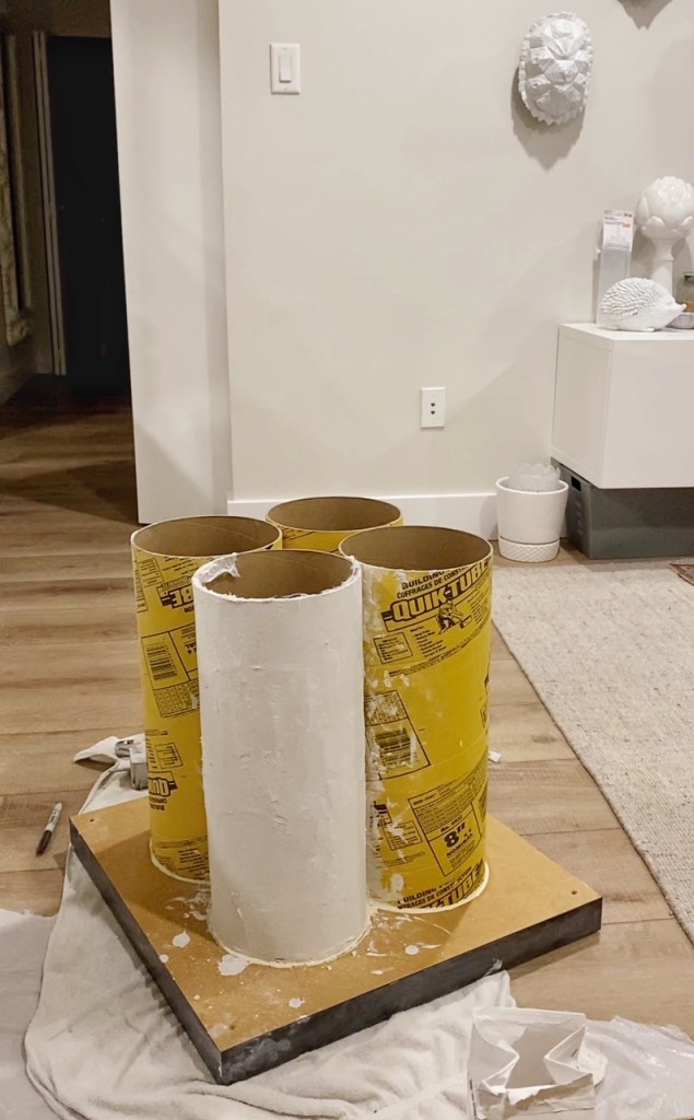 Plaster of Paris and cheesecloth turns this old IKEA lack side table into a sculptural accent table. 
