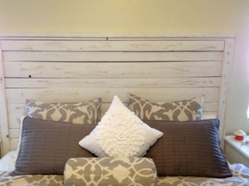 a whitewashedheadboard of planks like this one can be easily made by you yourself, even if there's no headboard in your bed