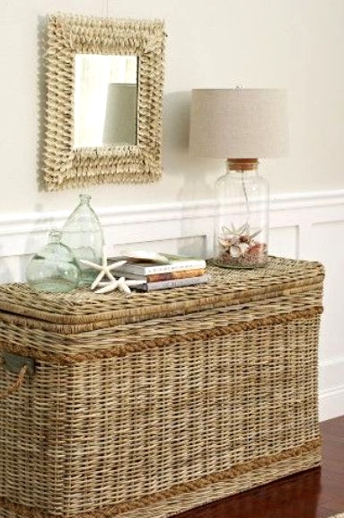 a tall and sleek wicker chest will be a nice idea for storage and an alternative to a console table in your entryway, it's great for a beach or coastal space