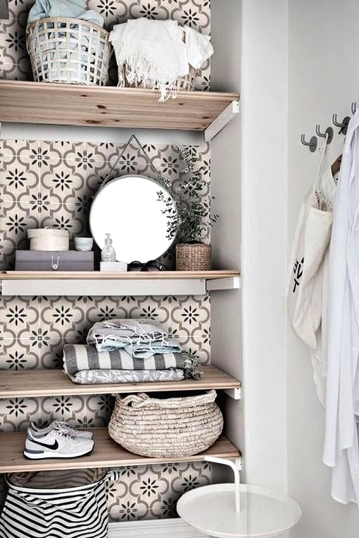 a little laundry nook with open shelving styled with tan printed tile stickers to make it more eye-catchy and chic