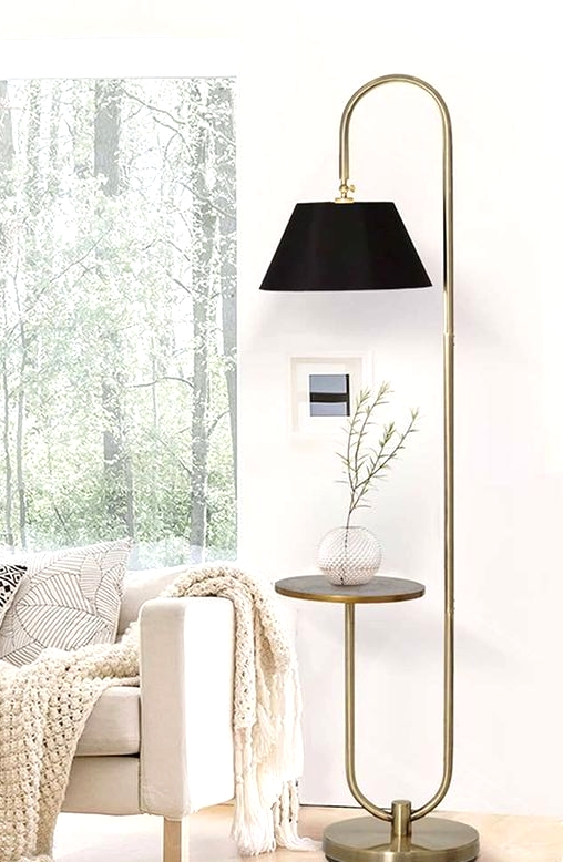a fantastic tall floor lamp with an additional side table is a lovely functional furniture piece that will make an accent