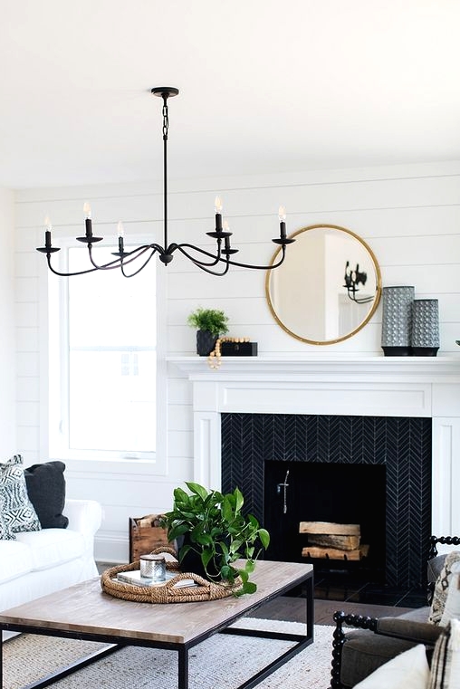 this beautiful vintage-inspired black chandelier adds charm and chic to the space and finishes off the look