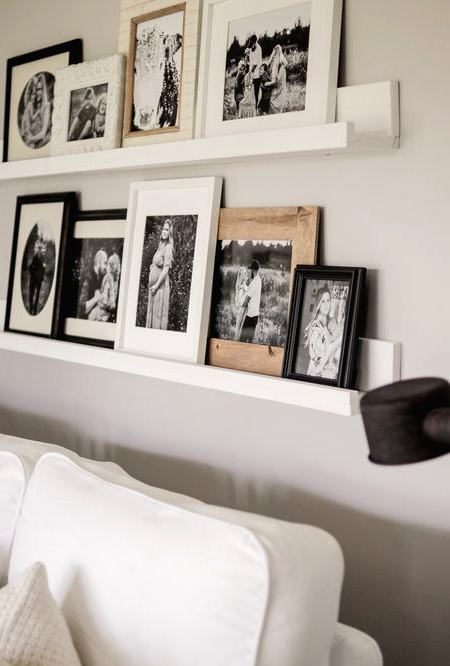 if you have ledges, use them to create your own gallery wall - such a gallery wall is easy to change anytime