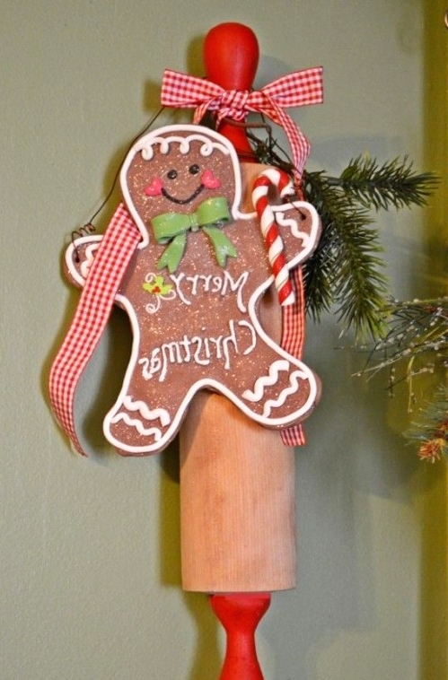 a rolling pin and a large faux gingerbread man compose lovely kitchen decor for Christmas