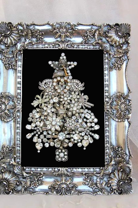 a refined brooch Christmas tree with beads and rhinestones in an embellished silver frame won't take floor space and will be gorgeous