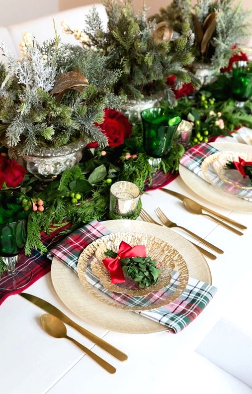 a stylish christmas tablescape with plaid linens