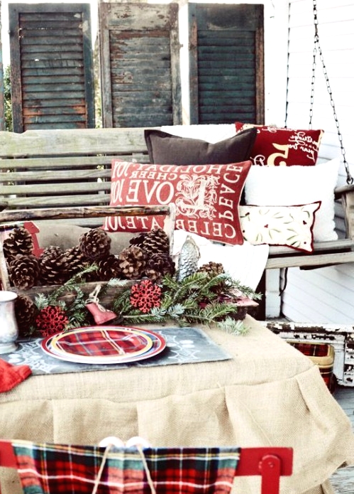 a plaid plate and a plaid blanket on the chair instantly give a holiday feel to the space, wherver you use them