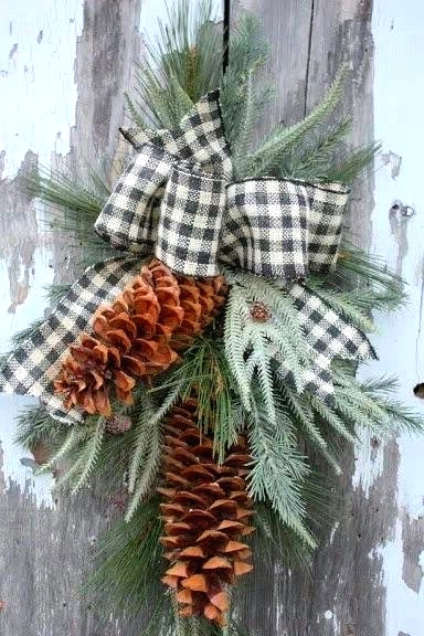 an evergreen and pinecone posie with a plaid bow can be used for traditional Christmas everywhere, and both indoors and outdoors