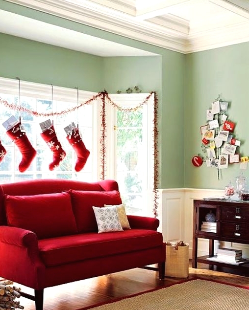 traditional red and white Christmas stockings hanging over the window is a creative way to style your space for Christmas