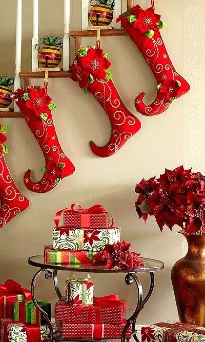 whimsical red and green elf stockings are a fun and bright decoration for Christmas to add a bit of cheerful touch to it