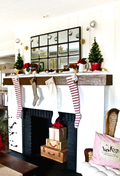 striped red and white, white and tan stockings make the space look festive without any other decor and add coziness to it
