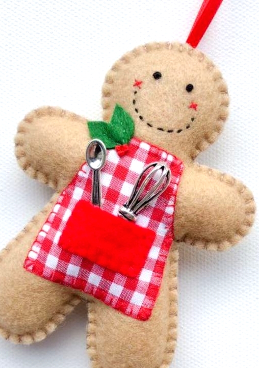 a felt cook gingerbread ornament in an apron, with kitchen utensils is a cute and fun Christmas decoration to rock