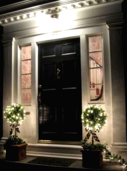 potted topiaries with lights will light up the entrance or your porch and make your space super welcoming