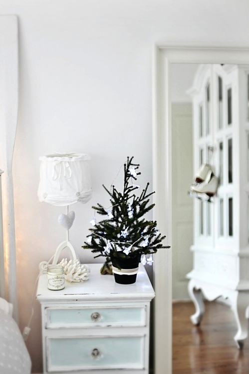 a beach Christmas tree decorated with small clay starfish is a beautiful idea to style your space for holidays
