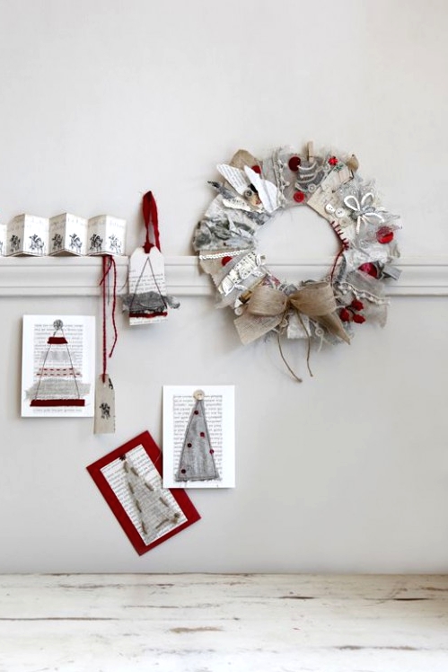 red and grey paper Christmas decor - a wreath, Christmas trees on paper and some pages with printing