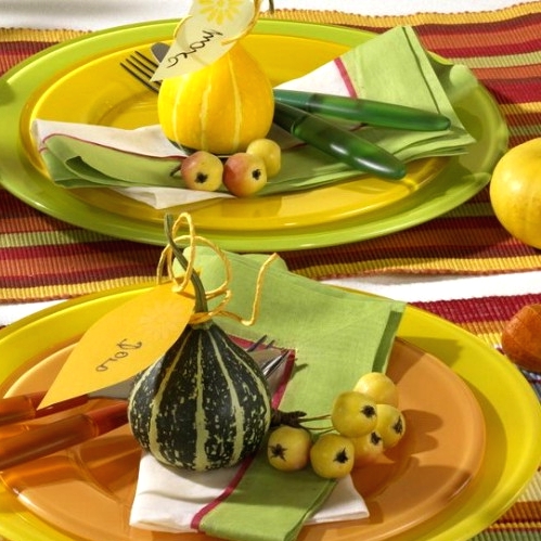 yellow, green and orange plates tiered are great for a fall or Thanksgiving tablescape as they feature truly fall colors and turn on the brights