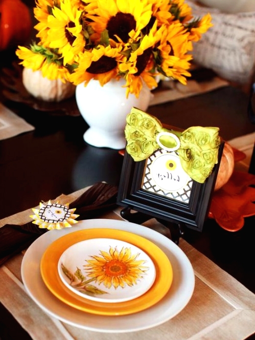 a layered white, yellow and white sunflower plate are great for a bright vintage rustic place setting and look nice