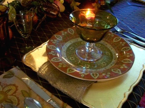 a square yellow plate and an orange and green patterned one for a colorful and bright rustic Thanksgiving tablescape