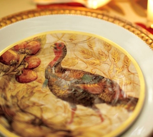 a white, gold and turkey printed plates layered are amazing for a vintage and elegant Thanksgiving tablescape