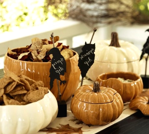 porcelain pumpkin-shaped bowls can be a nice solution for a fall or Thanksgiving tablescape and they can be rocked at Halloween for serving treats