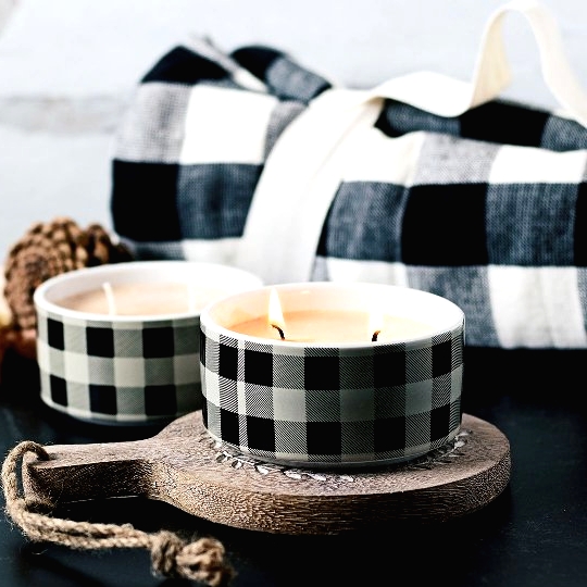 gorgeous pumpkin spice double wick candles with buffalo check on the outside are perfect for fall and Thanksgiving decor