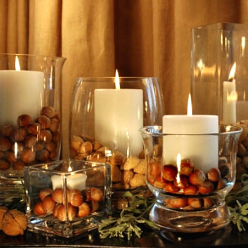 glass jars with nuts and pillar candles are great for both fall and winter decor and will do for Thanksgiving and Christmas
