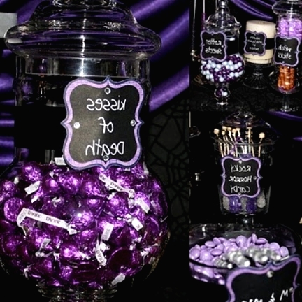 a black and purple sweets table with candies, desserts and sweets of various kinds is a gorgeous idea for a Halloween party