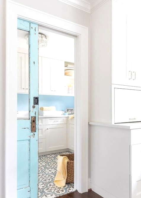 a blue shabby chic glass pocket door is a cool idea for a shabby chic, vintage or farmhouse space and adds a bit of color