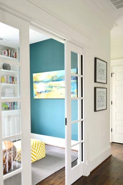 white French pocket doors are a stylish solution to separate the space and do it in a delicate way without heavy looks