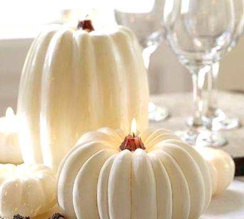 white pumpkin candles are perfect decorations of Halloween and will make your tablescape cozier and more inviting