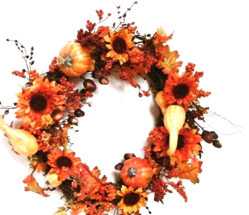 a bright fall or Thanksgiving wreath of faux blooms, gourds and berries is a pretty idea that you can easily DIY