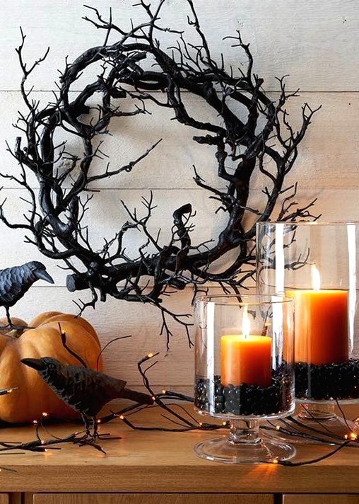 a black branch wreath is a gorgeous idea for Halloween, it's easy to DIY and it looks scary enough to use it