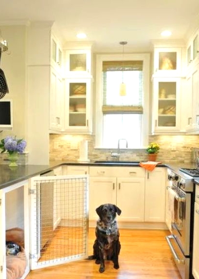 a cozy neutral kitchen with a farmhouse feel, a faux stone backsplash and a dog kennel with a mattress that is enough for two pets